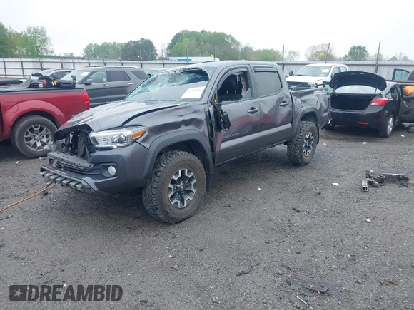 2022 Toyota Tacoma SR with VIN 3TMCZ5AN1NM476353, listed as a IAAI auction lot 41938107 with 51,782 mi miles and . Bid and sale history available at DreamBid. Image 2.