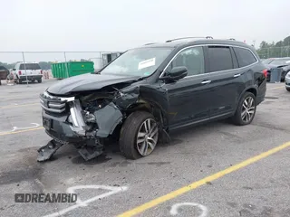 2017 Honda Pilot Touring with VIN 5FNYF6H93HB068846, listed as a IAAI auction lot 42083050 with 108,787 mi miles and . Bid and sale history available at DreamBid. Image 17.