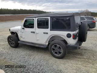 2023 Jeep Wrangler Sahara with VIN 1C4HJXEN1PW598815, listed as a Copart auction lot 42964275 with 29,458 mi miles and Salvage Title. Bid and sale history available at carsss.com. Image 2.