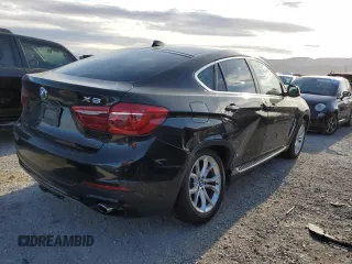 2015 BMW X6 xDrive35i with VIN 5UXKU2C58F0N77348, listed as a Copart auction lot 50579803 with 93,061 mi miles. Bid and sale history available at carsss.com. Image 3.