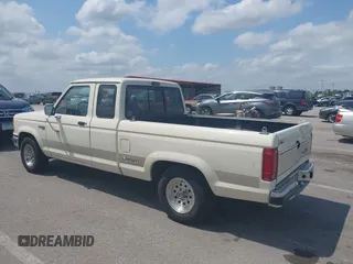1990 Ford Ranger z VIN 1FTCR14T2LPB21654, wystawiony jako IAAI lot #42270150 z przebiegiem 92 465 mil mil oraz . Historia ofert i sprzedaży dostępna na DreamBid. Obrazek 3.