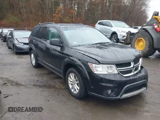 2014 Dodge Journey SXT z VIN 3C4PDCBG5ET178026, wystawiony jako IAAI lot #38903738 z przebiegiem 147 641 mil mil oraz . Historia ofert i sprzedaży dostępna na DreamBid. Obrazek 1.