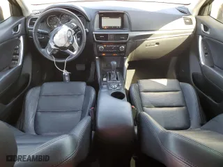 2016 Mazda CX-5 Grand Touring with VIN JM3KE4DY0G0674717, listed as a Copart auction lot 52053165 with 36,341 mi miles and Salvage Title. Bid and sale history available at carsss.com. Image 8.