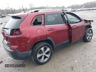2019 Jeep Cherokee Limited with VIN 1C4PJMDNXKD133952, listed as a IAAI auction lot 41944222 with 75,410 mi miles and . Bid and sale history available at DreamBid. Image 4.