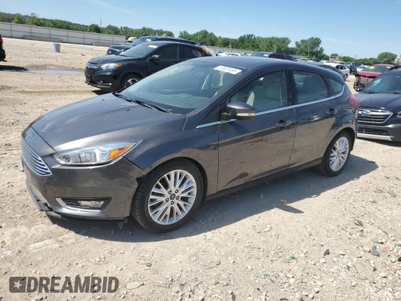 2017 Ford Focus Titanium с VIN 1FADP3N2XHL287713, выставлен на аукционе Copart как лот 57823155 с пробегом 51 828 миль миль и Списание • Salvage title. История ставок и продаж доступна на DreamBid. Изображение 1.