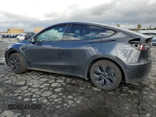 2024 Tesla Model Y Long Range z VIN 7SAYGAEE1RF107617, wystawiony jako Copart lot #48224405 z przebiegiem 10 637 mil mil oraz Szkoda całkowita • Salvage title. Historia ofert i sprzedaży dostępna na DreamBid. Obrazek 2.