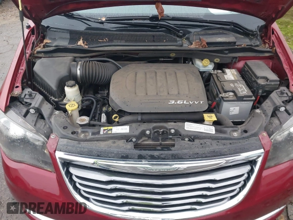2014 Chrysler Town & Country S with VIN 2C4RC1HG6ER307238, listed as a IAAI auction lot 41852666 with 131,301 mi miles. Bid and sale history available at carsss.com. Image 10.