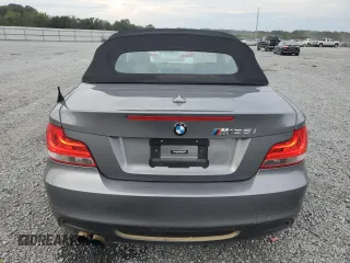 2012 BMW 1 Series 135i with VIN WBAUN7C59CVM26082, listed as a Copart auction lot 74711754 with 77,152 mi miles and Salvage title. Bid and sale history available at DreamBid. Image 6.