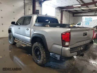 2018 Toyota Tacoma SR with VIN 5TFCZ5AN0JX132968, listed as a IAAI auction lot 41605762 with 106,233 mi miles. Bid and sale history available at carsss.com. Image 3.