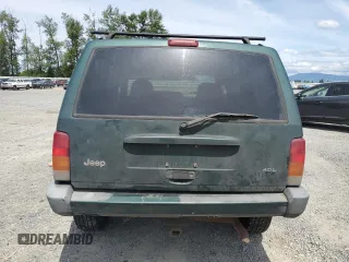 1999 Jeep Cherokee Sport with VIN 1J4FF68S2XL570795, listed as a Copart auction lot 61860585 with 320,467 mi miles and Salvage title. Bid and sale history available at DreamBid. Image 6.