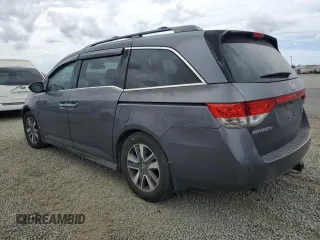 2015 Honda Odyssey Touring Elite with VIN 5FNRL5H95FB058873, listed as a Copart auction lot 53744295 with 139,856 mi miles and Salvage title. Bid and sale history available at DreamBid. Image 2.