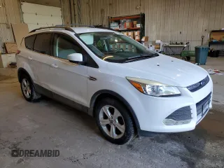 2014 Ford Escape SE with VIN 1FMCU9GX3EUA09635, listed as a Copart auction lot 48406645 with 136,412 mi miles and Salvage Title. Bid and sale history available at DreamBid. Image 4.