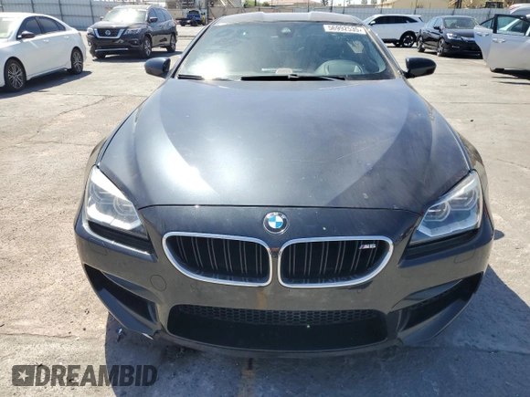 2015 BMW M6 z VIN WBSLX9C58FD160609, wystawiony jako Copart lot #56992535 z przebiegiem 52 324 mil mil oraz Tytuł czysty. Historia ofert i sprzedaży dostępna na DreamBid. Obrazek 5.