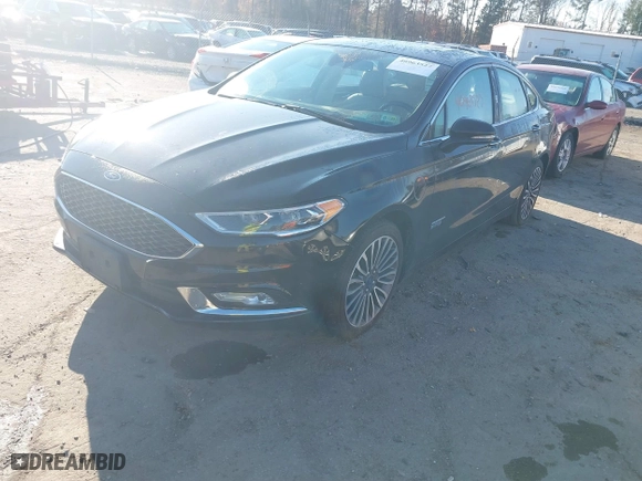 2017 Ford Fusion Energi Titanium with VIN 3FA6P0SU2HR309895, listed as a IAAI auction lot 40963527 with NaN miles. Bid and sale history available at carsss.com. Image 17.