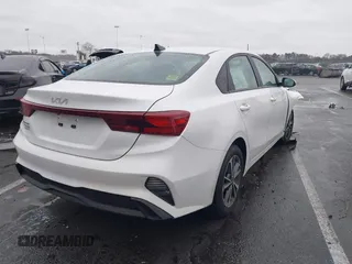2022 Kia Forte LXS with VIN 3KPF24AD0NE455376, listed as a IAAI auction lot 41943951 with 52,535 mi miles and . Bid and sale history available at carsss.com. Image 4.