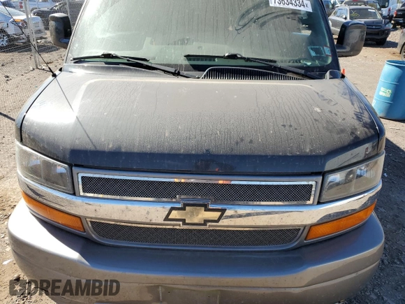 2017 Chevrolet Express Cargo with VIN 1GCWGAFG1H1107676, listed as a Copart auction lot 73634334 with 107,314 mi miles and Salvage title. Bid and sale history available at DreamBid. Image 12.