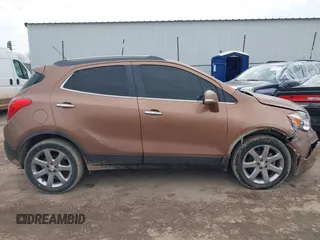 2016 Buick Encore Leather with VIN KL4CJCSB6GB553593, listed as a IAAI auction lot 41582660 with 95,713 mi miles and . Bid and sale history available at carsss.com. Image 13.