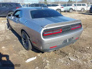 2016 Dodge Challenger SRT 392 with VIN 2C3CDZDJ5GH165903, listed as a IAAI auction lot 41281438 with 7,516 mi miles. Bid and sale history available at carsss.com. Image 3.