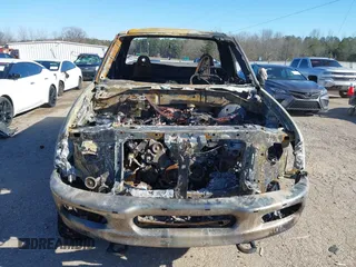1998 Ford F-150 with VIN 1FTRF18L9WNA48859, listed as a IAAI auction lot 41287410 with Not provided miles and . Bid and sale history available at DreamBid. Image 6.