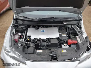 2022 Toyota Prius L Eco with VIN JTDKAMFU9N3185999, listed as a IAAI auction lot 41428106 with 50,798 mi miles. Bid and sale history available at carsss.com. Image 10.