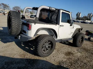 2010 Jeep Wrangler Sport with VIN 1J4AA2D16AL144842, listed as a Copart auction lot 50173535 with 106,000 mi miles and Salvage Title. Bid and sale history available at carsss.com. Image 3.