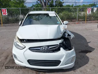 2014 Hyundai Accent GLS with VIN KMHCU4AE8EU608539, listed as a IAAI auction lot 41946784 with 106,709 mi miles and . Bid and sale history available at carsss.com. Image 6.