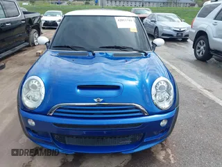 2006 MINI Hardtop S z VIN WMWRE33596TL23436, wystawiony jako IAAI lot #42011749 z przebiegiem 73 381 mil mil oraz . Historia ofert i sprzedaży dostępna na DreamBid. Obrazek 12.