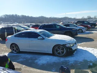 2016 BMW 4 Series 428i with VIN WBA4A9C50GG696366, listed as a IAAI auction lot 41615789 with 103,763 mi miles. Bid and sale history available at carsss.com. Image 13.