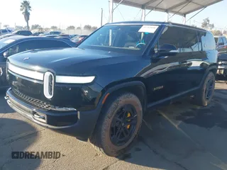 2024 Rivian R1S Adventure with VIN 7PDSGABAXRN034598, listed as a IAAI auction lot 41312180 with 23,615 mi miles. Bid and sale history available at carsss.com. Image 18.