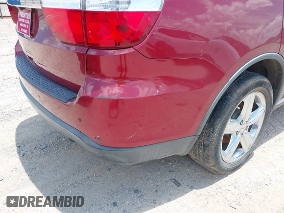2013 Dodge Durango SXT with VIN 1C4RDHAG6DC683865, listed as a IAAI auction lot 42615546 with 113,545 mi miles and . Bid and sale history available at DreamBid. Image 6.