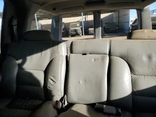 1999 GMC Yukon with VIN 1GKEK13R7XJ715284, listed as a Copart auction lot 83627984 with 186,518 mi miles and Non Repairable. Bid and sale history available at carsss.com. Image 10.