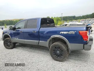 2016 Nissan Titan XD PRO-4X with VIN 1N6BA1F41GN511765, listed as a Copart auction lot 60913014 with 145,365 mi miles and Clean Title. Bid and sale history available at carsss.com. Image 2.