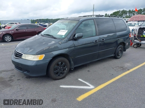 2003 Honda Odyssey EX-L with VIN 5FNRL18963B059910, listed as a IAAI auction lot 42415037 with 267,600 mi miles and . Bid and sale history available at DreamBid. Image 2.