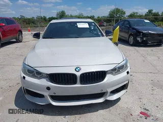 2015 BMW 4 Series 428i xDrive z VIN WBA3N5C58FK198825, wystawiony jako IAAI lot #41919172 z przebiegiem 125 421 mil mil oraz . Historia ofert i sprzedaży dostępna na DreamBid. Obrazek 12.