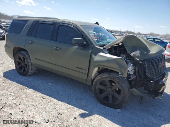 2015 GMC Yukon Denali with VIN 1GKS2CKJXFR553886, listed as a Copart auction lot 50463745 with 134,838 mi miles and Salvage Title. Bid and sale history available at carsss.com. Image 4.