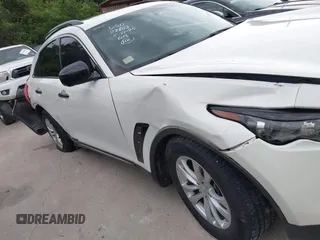 2016 Infiniti QX70 z VIN JN8CS1MU8GM671269, wystawiony jako IAAI lot #42467096 z przebiegiem 74 918 mil mil oraz . Historia ofert i sprzedaży dostępna na DreamBid. Obrazek 13.