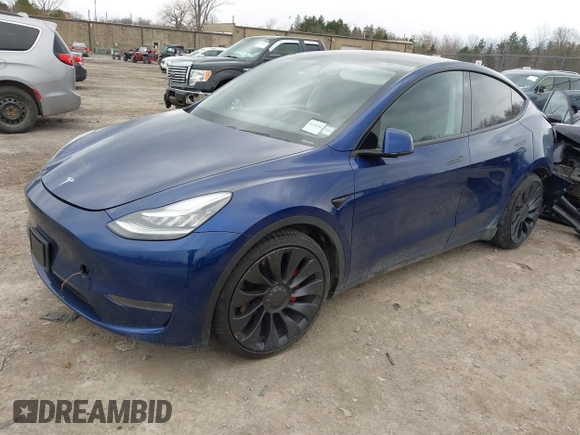 2020 Tesla Model Y Long Range with VIN 5YJYGDEF0LF000380, listed as a IAAI auction lot 41867489 with 66,294 mi miles and . Bid and sale history available at DreamBid. Image 2.