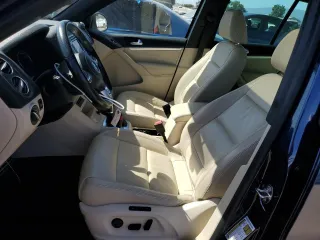 2015 Volkswagen Tiguan SE with VIN WVGAV7AX2FW094359, listed as a Copart auction lot 60101885 with 106,305 mi miles and Salvage title. Bid and sale history available at DreamBid. Image 7.
