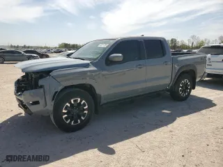 2022 Nissan Frontier PRO-X with VIN 1N6ED1EJ8NN609619, listed as a Copart auction lot 50011785 with 76,078 mi miles and Salvage Title. Bid and sale history available at carsss.com. Image 1.