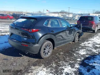 2024 Mazda CX-30 2.5 S with VIN 3MVDMBAM3RM715219, listed as a IAAI auction lot 41262034 with 1,256 mi miles. Bid and sale history available at carsss.com. Image 4.