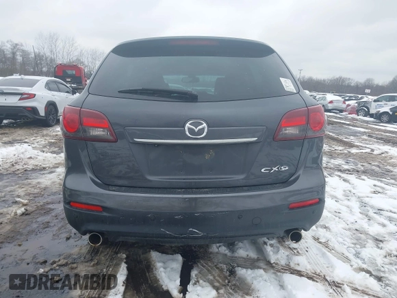 2014 Mazda CX-9 Grand Touring with VIN JM3TB3DV9E0440506, listed as a IAAI auction lot 41537718 with 217,299 mi miles and . Bid and sale history available at DreamBid. Image 16.