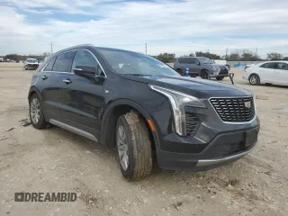 2022 Cadillac XT4 FWD Premium Luxury z VIN 1GYFZCR42NF135325, wystawiony jako Copart lot #43133215 z przebiegiem 48 998 mil mil oraz Szkoda całkowita • Salvage title. Historia ofert i sprzedaży dostępna na DreamBid. Obrazek 4.
