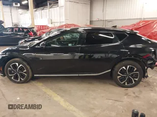 2022 Kia EV6 Wind z VIN KNDC3DLC8N5075492, wystawiony jako IAAI lot #41671331 z przebiegiem 22 122 mil mil oraz . Historia ofert i sprzedaży dostępna na DreamBid. Obrazek 15.