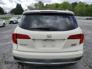 2017 Honda Pilot Touring with VIN 5FNYF6H91HB092062, listed as a Copart auction lot 52761765 with 141,750 mi miles and Salvage Title. Bid and sale history available at DreamBid. Image 6.
