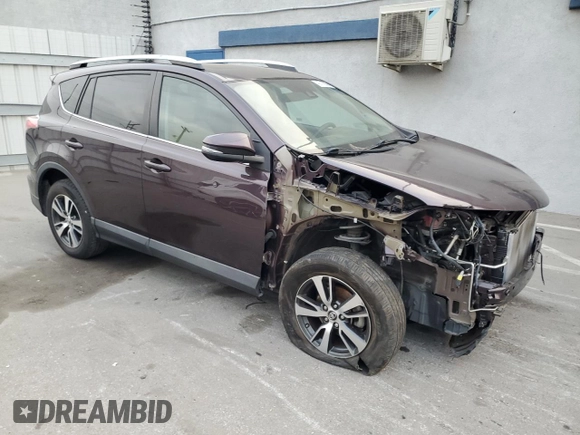 2017 Toyota RAV4 XLE with VIN 2T3WFREV0HW371653, listed as a Copart auction lot 43712935 with 96,694 mi miles and Salvage Title. Bid and sale history available at carsss.com. Image 4.