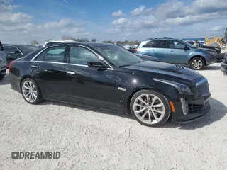 2016 Cadillac CTS-V z VIN 1G6A15S62G0158627, wystawiony jako Copart lot #76986744 z przebiegiem Nie podano mil oraz Nie do naprawy. Historia ofert i sprzedaży dostępna na DreamBid. Obrazek 4.