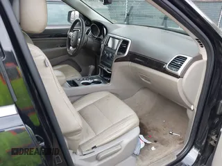 2012 Jeep Grand Cherokee Laredo with VIN 1C4RJEAG0CC316823, listed as a IAAI auction lot 41846479 with 215,317 mi miles. Bid and sale history available at carsss.com. Image 5.