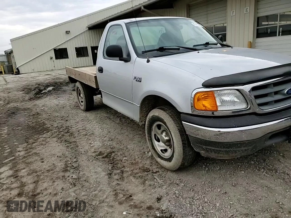 2004 Ford F-150 XL z VIN 2FTRF18274CA75519, wystawiony jako Copart lot #47450395 z przebiegiem 129 099 mil mil oraz Szkoda całkowita • Salvage title. Historia ofert i sprzedaży dostępna na DreamBid. Obrazek 11.