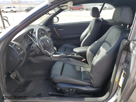 2011 BMW 1 Series 135i with VIN WBAUN7C59BVM24329, listed as a Copart auction lot 49263045 with 65,242 mi miles and Salvage Title. Bid and sale history available at carsss.com. Image 7.
