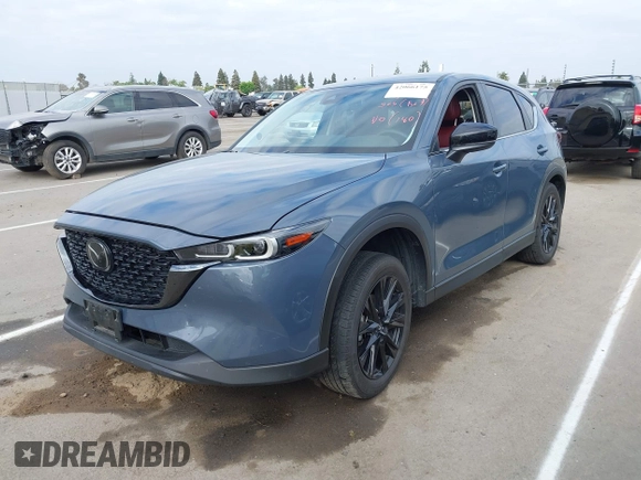 2023 Mazda CX-5 2.5 S Preferred Package with VIN JM3KFBCM0P0255265, listed as a IAAI auction lot 42066175 with 43,213 mi miles. Bid and sale history available at carsss.com. Image 2.